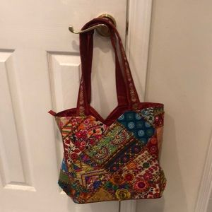 Beautiful multicolored bag.  Never worn!